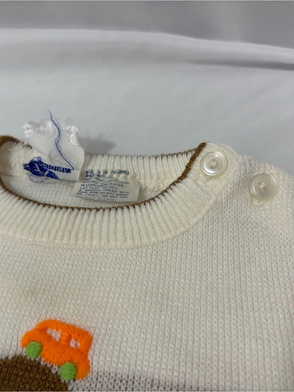 Vintage 1980’s  Little Angel White & Brown Baby Sweater with Colorful Car Motif